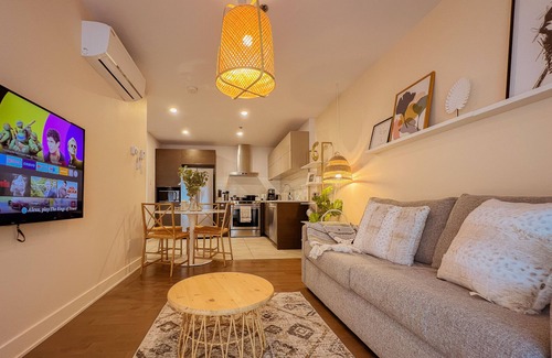 Monkland Village Condo | Modern King Suite with WiFi, Gym & Terrace Near Downtown