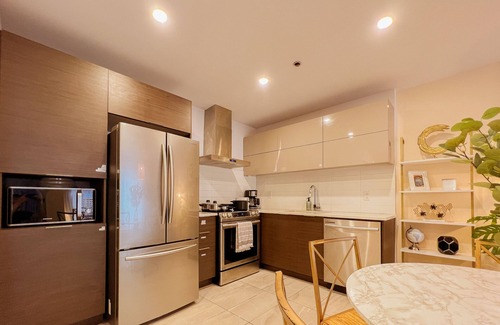 Monkland Village Condo | Modern King Suite with WiFi, Gym & Terrace Near Downtown