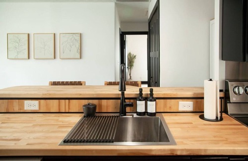 George Haywood's Lakefront Apartment | Inviting Modern Cottage with Hot Tub near Lake Erie