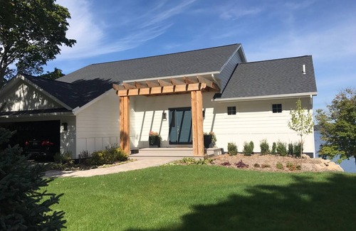 Whitehall House | Elegant Lakefront Home with Dock and Private Plunge Pool