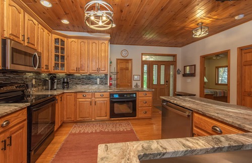 Oakland House | Lakefront Escape: Private Dock, Fire Pit & Spa Amenities