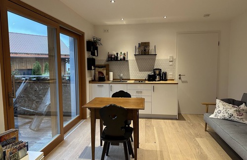 Konigsdorf Apartment | Sunlit Terrace with Garden, Rated 10/10 for Guest Comfort