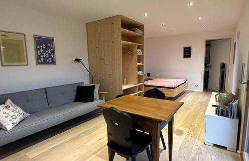Konigsdorf Apartment | Sunlit Terrace with Garden, Rated 10/10 for Guest Comfort