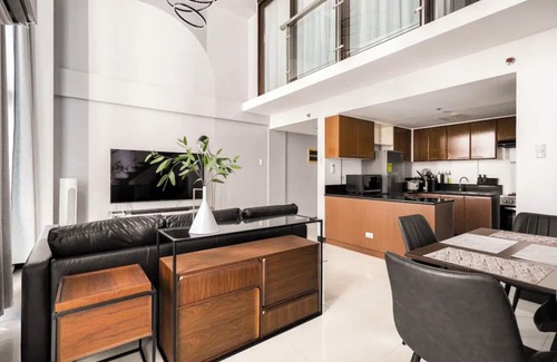 Bagumbayan Apartment | Modern Loft Apartment in Eastwood City - with gym & pool + FREE parking!