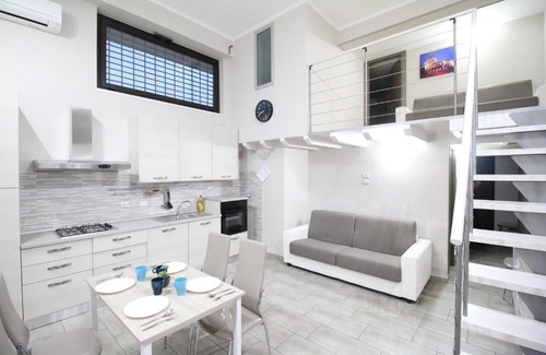 Zona XVI Torrenova Apartment | Stylish Loft Apartment with Pet-Friendly Amenities
