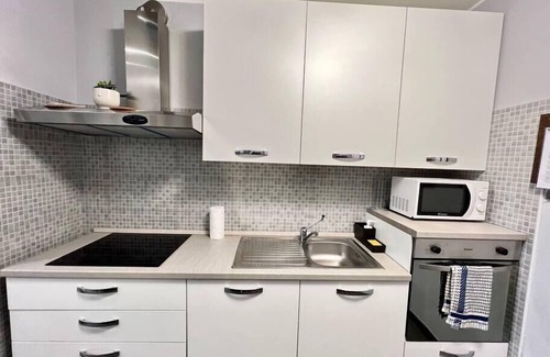 Collegno Apartment | Modern Loft Retreat with Hot Tub and Kitchen Amenities