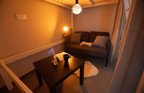 Collegno Apartment | Modern Loft Retreat with Hot Tub and Kitchen Amenities