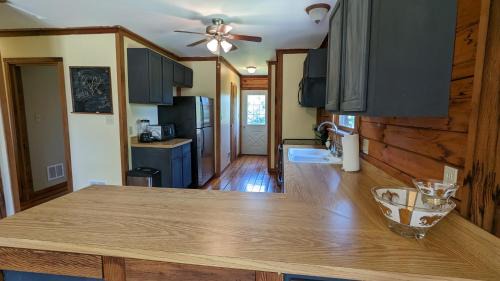 Winchester House | Modern Log House: Ideal for Your Pet-Friendly Getaway