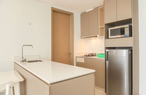 Pantai Indah Kapuk Apartment | Modern 2Br Gold Coast Apartment with Pool & Breakfast