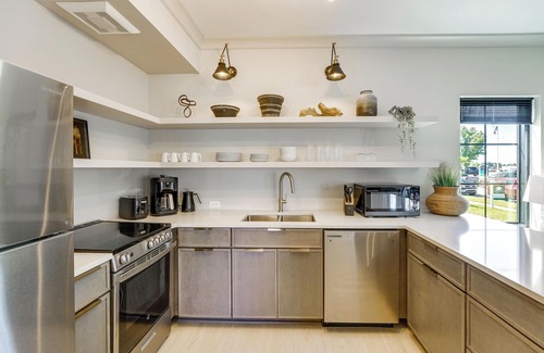 Ludington Condo | Modern Ludington Condo Across From the Lake!