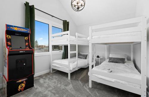 Jasper Place House | Modern Home with King Bed and Arcade Fun for Families