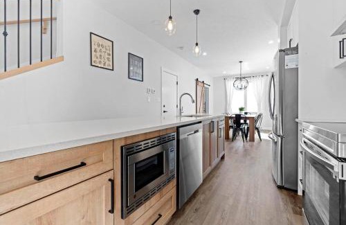 Jasper Place House | Modern Home with King Bed and Arcade Fun for Families