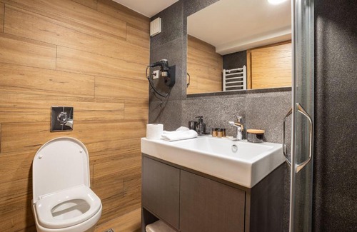 Kolasin Hotel | Modern Mountain Retreat: Family-Friendly & Hot Tub Access