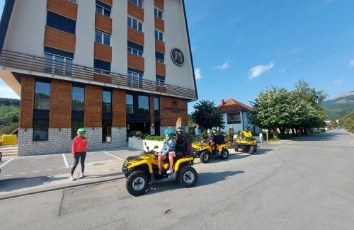 Kolasin Hotel | Modern Mountain Retreat: Family-Friendly & Hot Tub Access