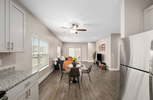 Grandville Condo | Stylish 2BR Condo with Garage, Patio & Pet-Friendly Perks