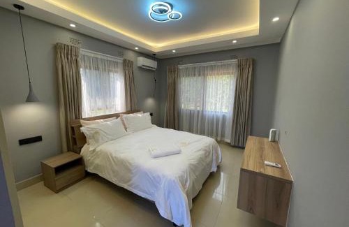 Lusaka Central Apartment | Modern Oasis - Exclusive Guest House Stay with Pool - New Kasama