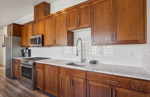Buckman Neighborhood Apartment | Modern Oasis in Central Eastside with Child-Friendly Amenities