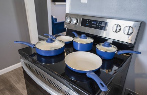 MacGregor House | Contemporary Oasis with Tesla Charger and Breakfast Included