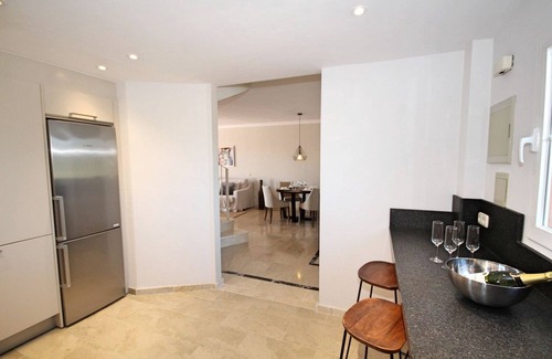 Nueva Andalucia Apartment | Stylish Penthouse with Panoramic Views, Steps from the Beach