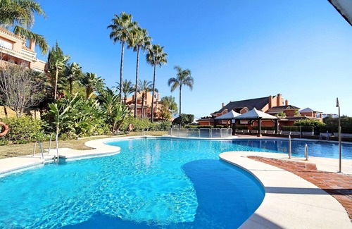 Nueva Andalucia Apartment | Stylish Penthouse with Panoramic Views, Steps from the Beach