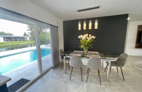 Davie Villa | Inviting Pool Home by the Lake, Close to Hardrock FLL