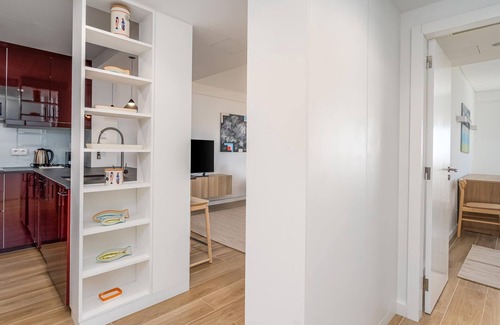 Meia Praia Apartment | Seaside Escape with Ocean View and Relaxing Spa