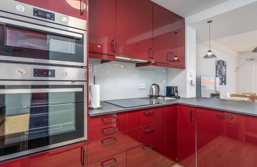 Meia Praia Apartment | Seaside Escape with Ocean View and Relaxing Spa