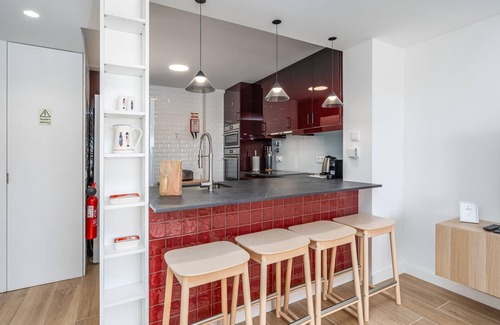 Meia Praia Apartment | Seaside Escape with Ocean View and Relaxing Spa