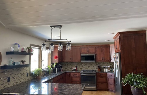 Breezy Point House | Exceptional Modern Rustic Home with Lake Views & Spa
