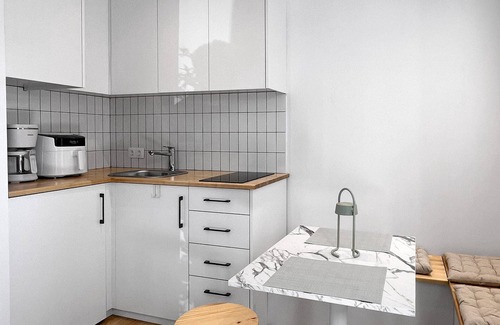 Olymbiaki Akti Apartment | Modern Seaside Retreat with Private Patio for Families