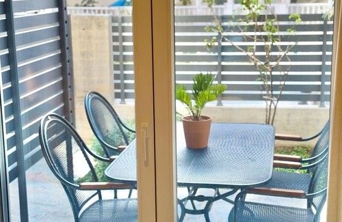 Olymbiaki Akti Apartment | Modern Seaside Retreat with Private Patio for Families