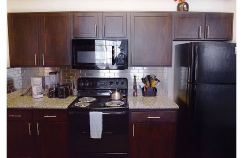 Stafford Apartment | Modern Executive 3BR with Breakfast & Kid-Friendly Space