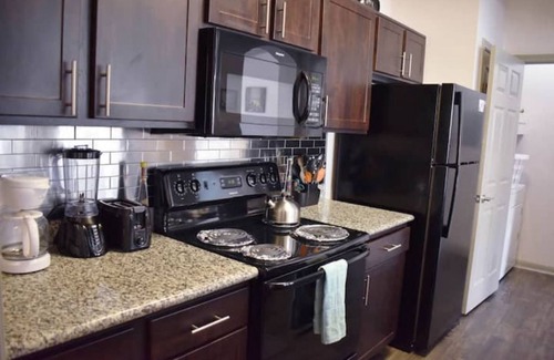 Stafford Apartment | Modern Executive 3BR with Breakfast & Kid-Friendly Space