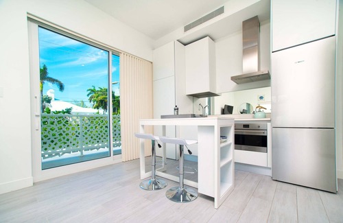 Seven Mile Beach Apartment | Experience The Grove 1BR Apt with Rooftop Pool & Ocean View