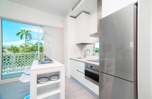 Seven Mile Beach Apartment | Experience The Grove 1BR Apt with Rooftop Pool & Ocean View
