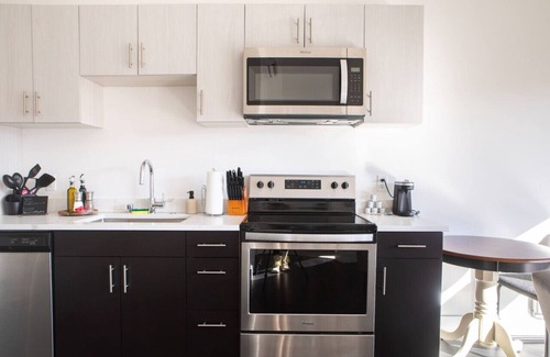 Milwaukee Apartment | Modern Studio Apt with Skywalk to Fiserv, Rooftop, and Parking