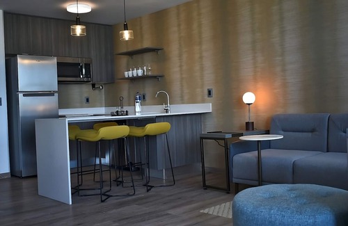 Xcumpich Hotel | Modern Studio l Residence Inn l King Bed + Kitchen + Desk