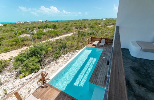 Long Bay Apartment | Cozy Ocean View Studio with Pool and Breakfast Included