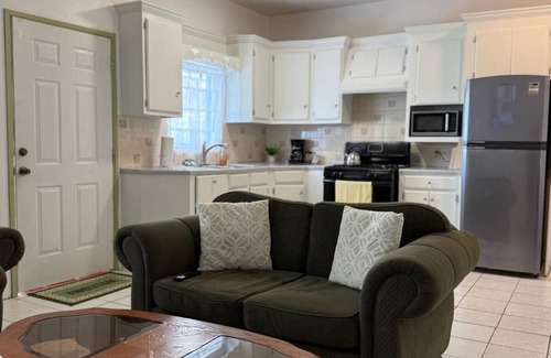 Stonyhill Apartment | Modern Suite with Balcony & Full Kitchen