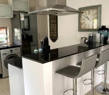 Greater Johannesburg Metropolitan Area Villa | Modern Two-Bed Townhouse with Pool, Rated 8.8/10