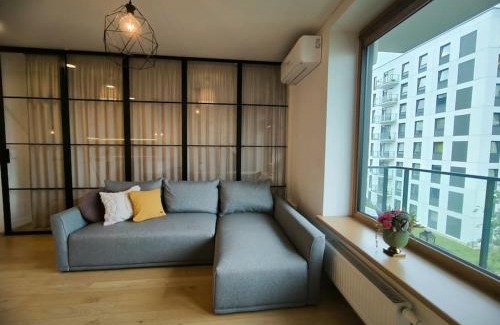 Vilnius Apartment | Modern Urban Retreat & Private Parking