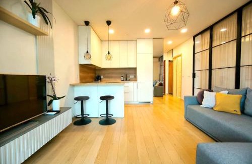 Vilnius Apartment | Modern Urban Retreat & Private Parking