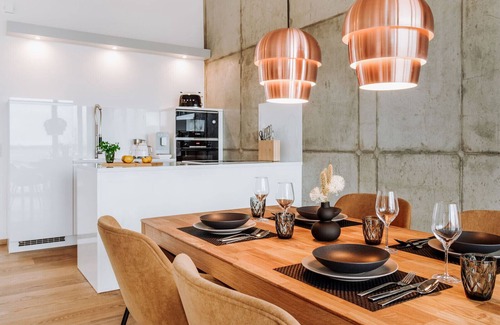 Waase Apartment | Modern Bodden Apartment with Sauna, Fireplace & Pool