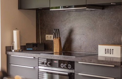 Nordhorn House | Modern Getaway: Sauna, Hot Tub & Fireplace Retreat