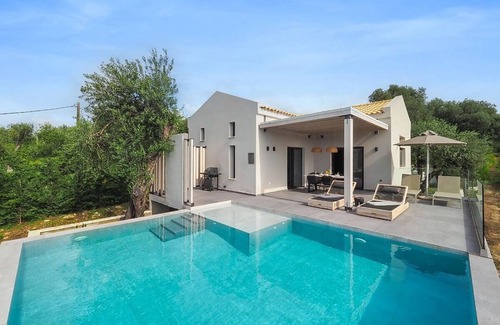 Roda Villa | Modern Villa with Private Pool & Ocean Views Near Beaches