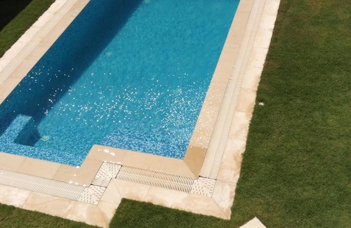 Aghir Villa | Modern Villa with Pool and Ocean View Steps from the Beach