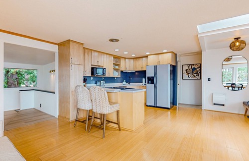 Adelma Beach House | Modern Water View Retreat with Game Room and Relaxing Spa