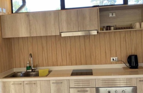 Pucon House | Cozy Riverfront Retreat with Spa and Breakfast Included