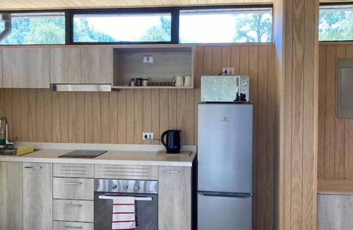 Pucon House | Cozy Riverfront Retreat with Spa and Breakfast Included