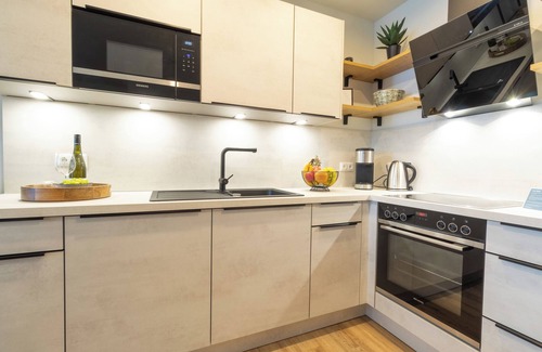 Dorumer Neufeld Apartment | Modern Apartment with Balcony & Sauna Near the Beach